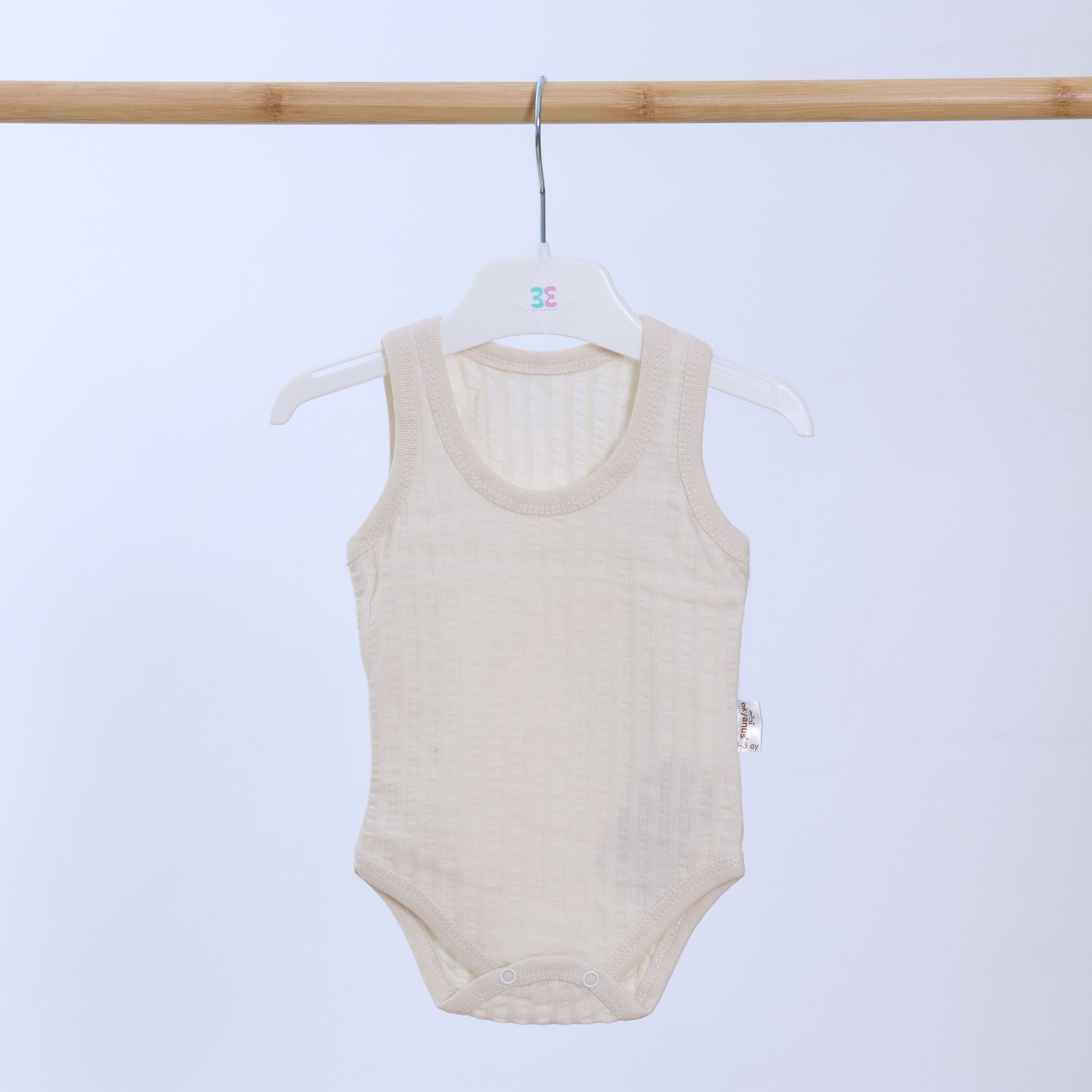 Ivory Ribbed Sleeveless Bodysuit