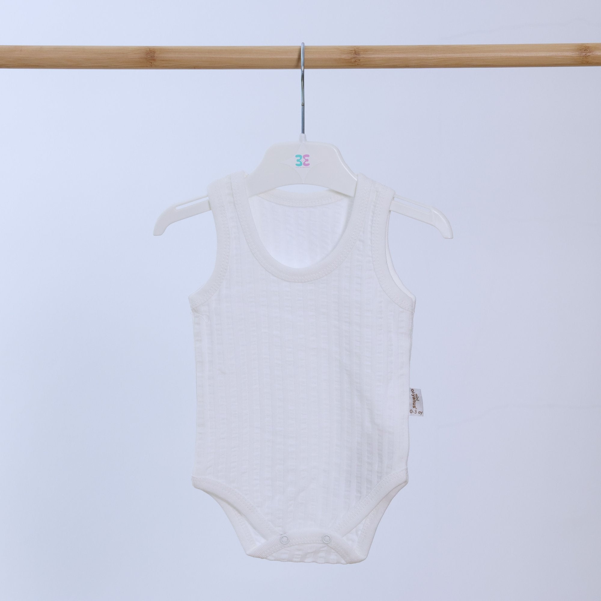 White Ribbed Sleeveless Bodysuit